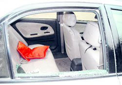 The broken windowpane of a car from which a bag containing Rs 3.5 lakh was stolen at Mandi Gobindgarh on Monday.