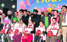People from different walks of life honoured during the Lohri Mela in Ludhiana on Monday.