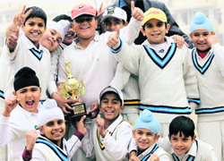 Winners of GNPS and CCA-36 with their trophy on the BTS grounds in Sector 48, Chandigarh, on Tuesday.