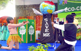 Schoolchildren perform at the inauguration of the annual eco meet-cum-exhibition organised by the environment department at the National Bal Bhawan in New Delhi on Tuesday.