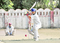A match of the 58th District Cricket League in progress at Survey Stadium in Dehradun on Tuesday.