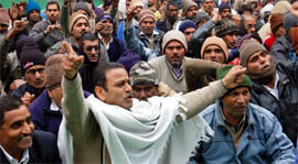 Employees of the electricity board stage a dharna to press for their demands in Gurgaon on Tuesday.