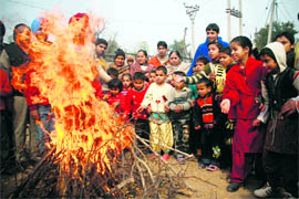 Inmates of SoS Home for Children,Narwal,celebrate Lohri in Jammu on Wednesday