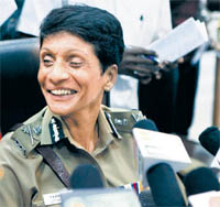 on top of world: Newly - appointed Tamil Nadu DGP Lathika Saran addresses a press conference after assuming charge in Chennai on Wednesday. She is the first woman DGP of the state and the second woman to head a state police in India, the first being Kanchan Chaudhry Bhattacharya in Uttarakhand.