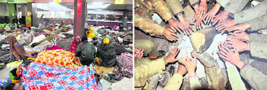 Pilgrims relax for the night at the railway station; and (right) policemen on duty warm their hands in Haridwar on Thursday.