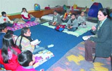 Simran Paintal tells a story to children during a workshop. 