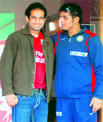 King XI Punjabs Irfan Pathan (L) and Reetinder Sodhi at PCA Stadium in Mohali on Thursday
