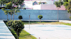 Ruling party MLA constructs a guard room and parking lot for his vehilce encroaching upon the land of the park in the posh Basant Avenue residential colony in Amritsar.