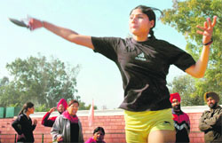 A girl participant at the Inter-School Athletics Championship in Sector 7, Chandigarh, on Friday. 