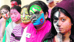 Girls at a face-painting competition during PSYCHOFEST 2010 at MCMDAV college, Sector 36, Chandigarh, on Friday. 