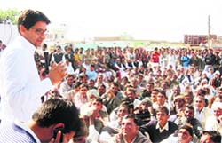 Rohtak MP Deepender Singh Hooda addresses villagers in Ellenabad