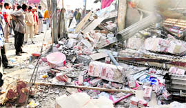 Debris of a shop that was demolished by the municipal corporation on the Link Road in Ludhiana on Friday.