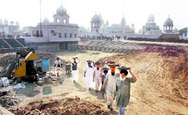 Kar sewa in progress on Friday at the Likhensar Gurdwara at Talwandi Sabo.