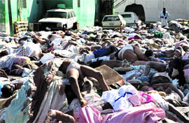 Thousands of bodies lie outside the General Hospital in Port-au-Prince