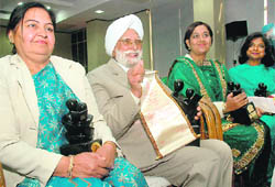 Tara Chand Saboo Excellence awardees (from left) Prem Lata, Pritam Singh Serai, Paramjit Kaur and Nirja Jain are all smiles after receiving the awards at PHD Chambers in Chandigarh on Saturday.