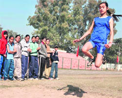 A participant in action during the Inter-School Athletics Meet in Chandigarh on Saturday.