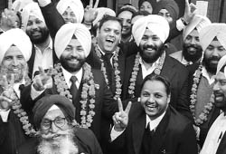 Members of the winning team of the Mohali District Bar Association celebrate their victory.