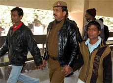 Members of a gang accused of serial killings being produced at a court in Gurgaon on Saturday.