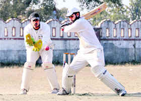 A match in progress at the District Cricket League in Dehradun on Saturday.