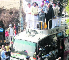 Chief Minister Bhupinder Singh Hooda addresses villagers from his Vijay Rath in Ellenabad on Saturday.