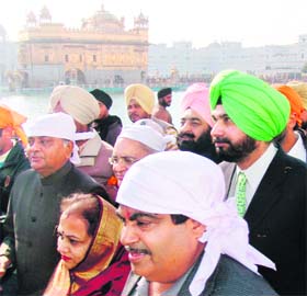 MAIDEN VISIT: BJP national president Nitin Gadkari, MP Navjot Sidhu and others pay obeisance at the Golden Temple in Amritsar