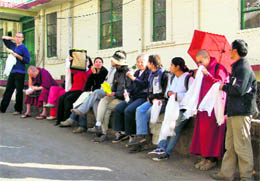 Tourists seem to make the most of the bright sunny day at McLeodganj on Sunday.