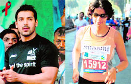 Bollywood actors John Abraham and Gul Panag at the Mumbai Marathon on Sunday.