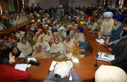 Victims of the 1984 anti-Sikh riots meeting ADC Shruti Singh in Bathinda on Sunday to discuss their grievances. 