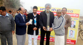 Players receiving awards at the Maghi Cup cricket tourney in Muktsar.