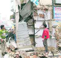 The remains of Bhatia Shake Corner which was bulldozed in an anti-encroachment drive in Roorkee on Monday. 