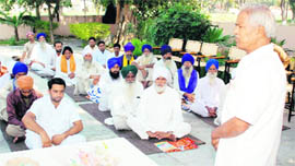Ray of Hope: Inmates of Patiala Central Jail studying at the adult education camp on the jail premises.