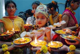 Girl students perform Saraswati Puja on the eve of Basant Panchami in Amritsar