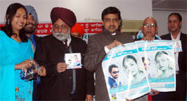 DIG Dr Jatinder Jain releasing a poster at the launch of an audio CD in Bathinda on Tuesday.