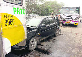 The mangled remains of a car that rammed into two buses on the Chandigarh-Rajpura road near Rajpura on Tuesday. 