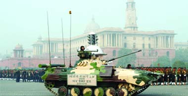 An army vehicle takes part in the rehearsal for the forthcoming Republic Day Parade in New Delhi 