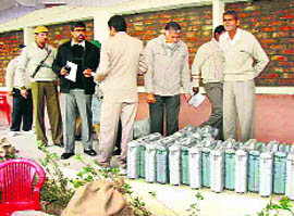 Poll parties collect EVMs at Panchayat Bhawan in Sirsa