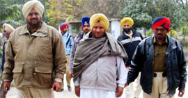 Daljit Singh, main accused in the Army recruitment scam, arrested by the police in the court complex at Faridkot on Tuesday.
