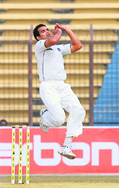 Zaheer Khan bowls during the third day of first Test against Bangladesh in Chittagong on Tuesday.