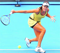 Ana Ivanovic returns a shot against Shenay Perry on Tuesday.