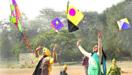 People enjoy kite flying on the occasion of Basant Panchami at Leisure Valley in Chandigarh on Wednesday. 