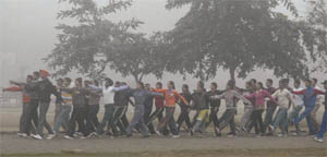 NCC cadets rehearse for the Republic Day celebrations despite fog at the Polo Ground in Patiala on Wednesday.