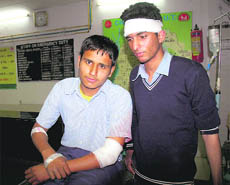 Students who were attacked outside a school by a group of youngsters at GMSSS-19 in Chandigarh on Wednesday.