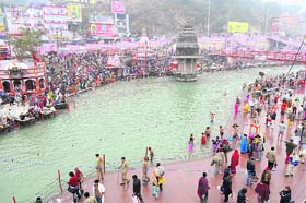 Pilgrims take a holy dip in the Ganga in Haridwar during the Basant Panchami bath during the Maha Kumbh