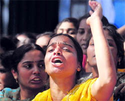 voice of telangana: A student during a protest over the Telangana statehood issue in Hyderabad on Wednesday