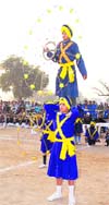 Nihangs display gatka skills on the concluding day of the national rural games at Anandpur Sahib