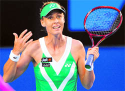Elena Dementieva reacts while playing against Justine Henin in their womens singles second round match on Wednesday