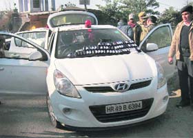 Car with Haryana number plate and a red beacon atop, which was taken into custody by the Himachal police at Bilaspur