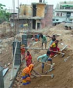Women and children work at a construction site in Jalandhar.