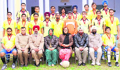 Football winners in a jubilant mood after winning the Division B Football Tournament of Panjab University, Chandigarh. 