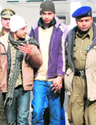The two youths who were arrested for robbery being produced at the district courts in Sector 17, Chandigarh, on Friday.